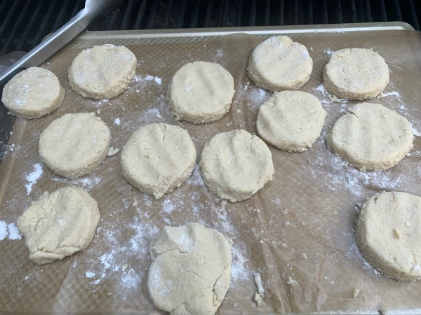 A bunch of sufganiyot ready to fry in hot oil.