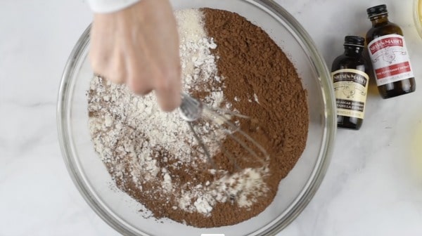 Whisking dry ingredients.