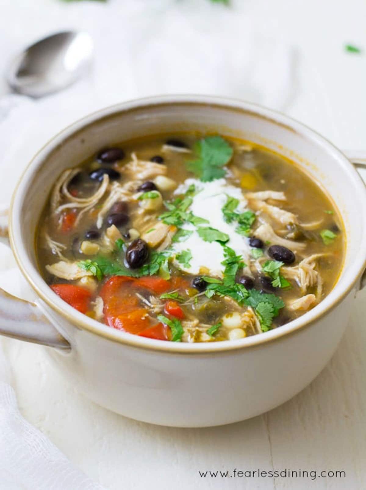 A side view of the bowl of gluten free taco soup.