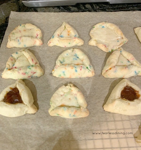 Photo of some hamantaschen unfolding when baked.