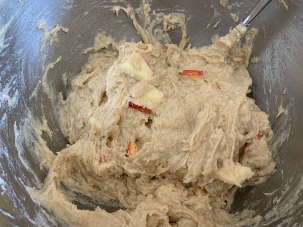 A close up of the gluten free apple muffin batter in a bowl.