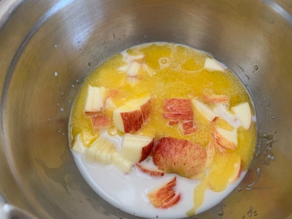 Apple muffin wet ingredients in a bowl.