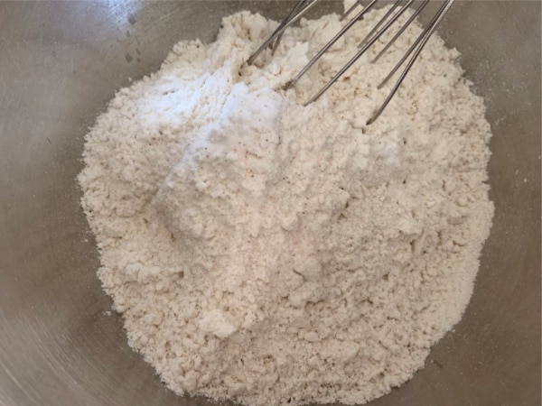 Lemon pound cake dry ingredients in a bowl.