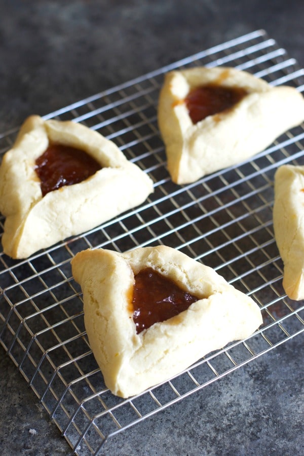 Hamantaschen cookies on a cooling rack.