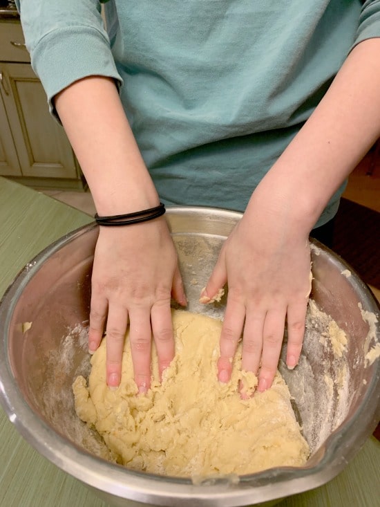 Mixing Hamantaschen dough by hand.
