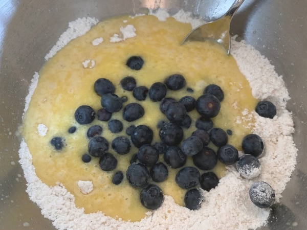 wet and dry ingredients in a bowl ready to be mixed