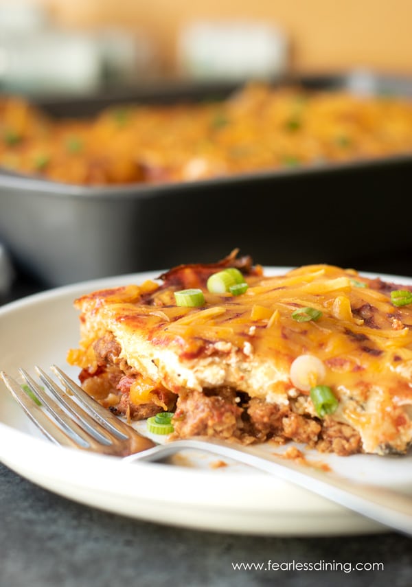 A plate with a big slice of vegan Mexican casserole.