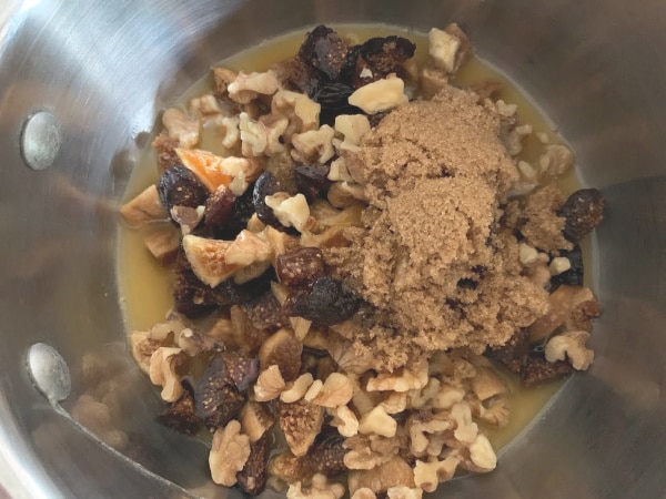 The chutney ingredients in a pot.