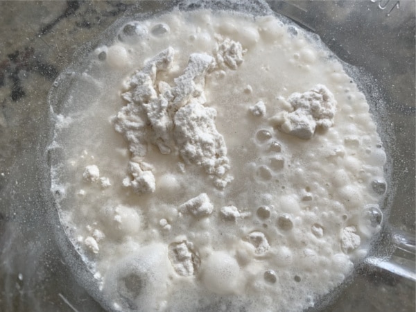 Flour and water in a glass jar.