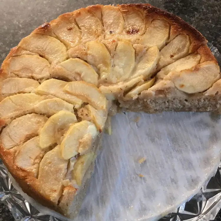 A reader, Sandra G sent in this photo of her apple cake with several pieces cut out.