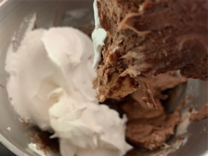 Whipping Nutella and whipped topping in a stand mixer.