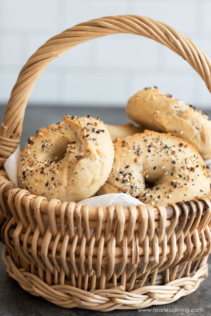 a basket filled with gluten free bagels.