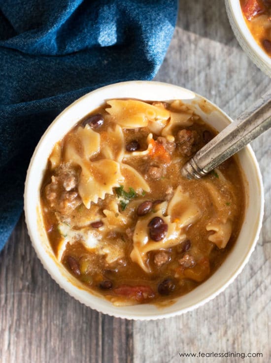 A big white bowl full of gluten free taco pasta.