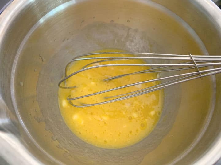 A photo of the whisked wet ingredients in a bowl.