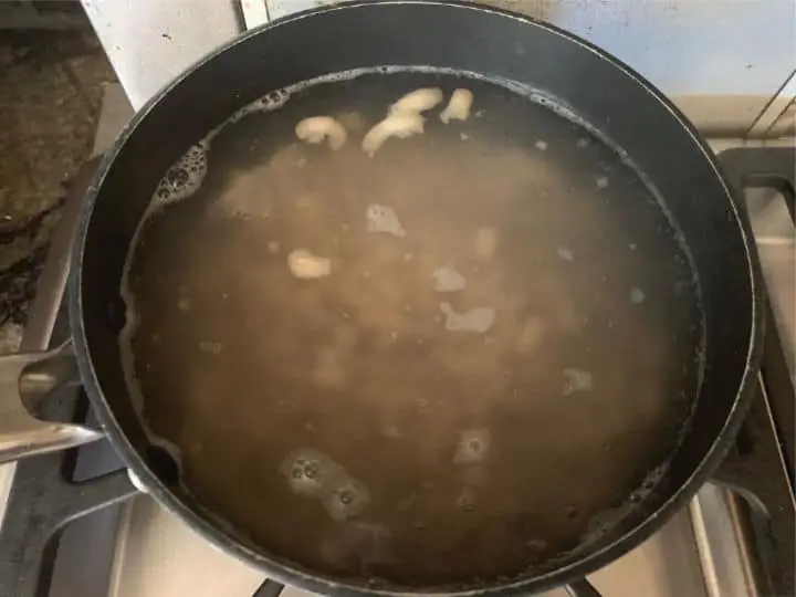 boiling macaroni in a pot