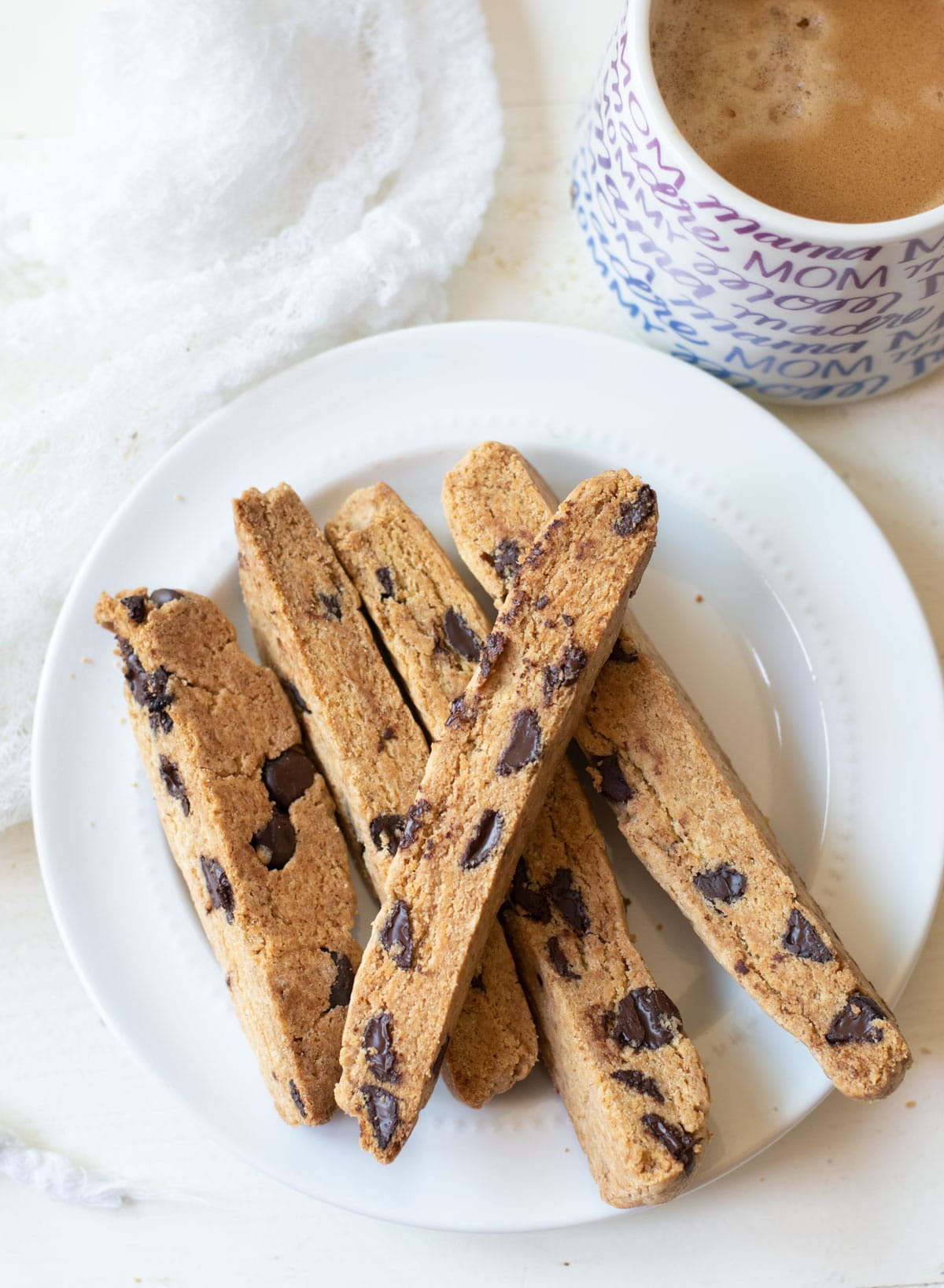 the featured image of a plate of gluten free chocolate chip biscotti