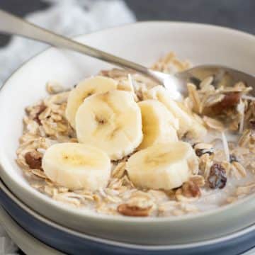 A photo of bircher muesli in a bowl on the table.