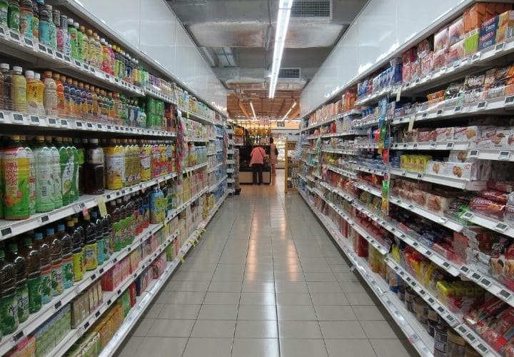 A long shopping aisle at the grocery store.