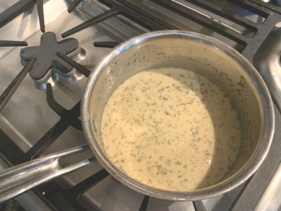 Dijon sauce simmering on the stove.