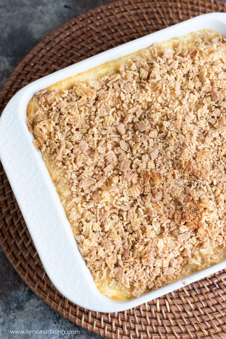 The top view of a baked noodle kugel in a white dish.