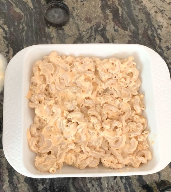 The mac and cheese in an 8x8 casserole dish.