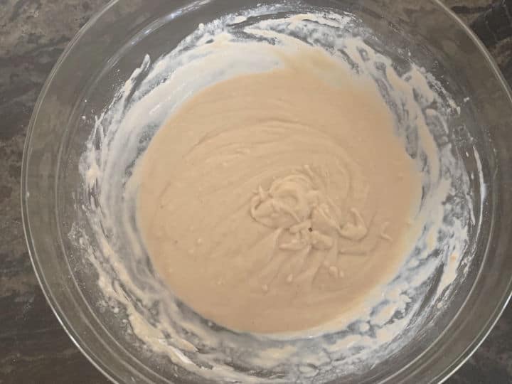 A bowl full of pancake batter/