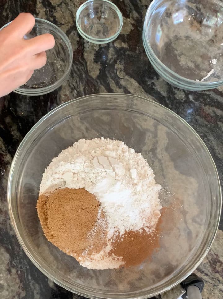 A photo of the dry pumpkin cake ingredients in a bowl.