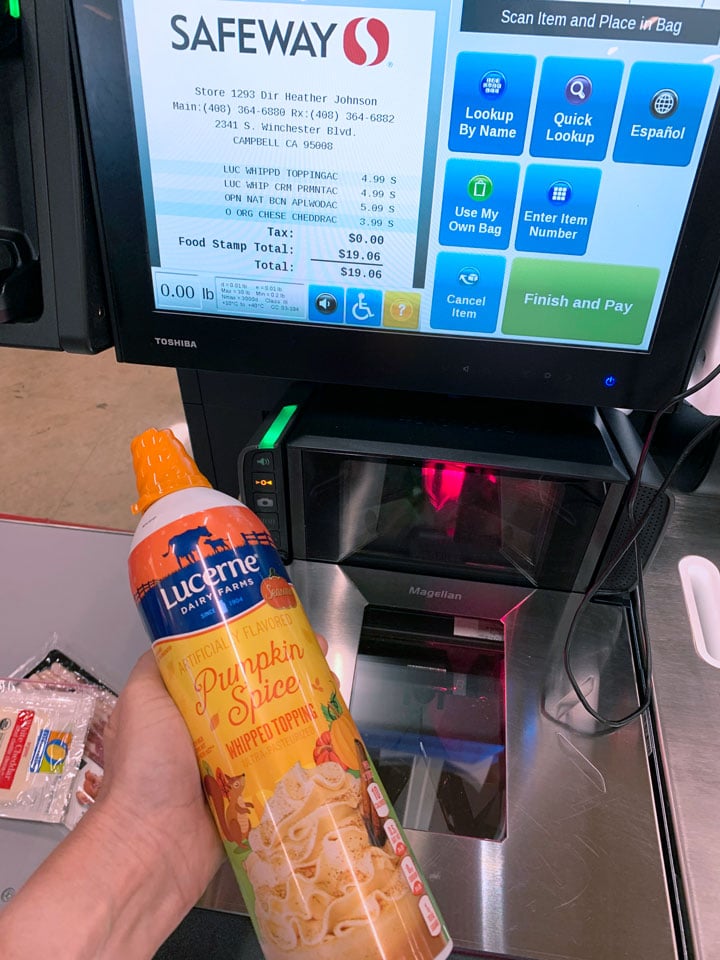 scanning Lucern whipped cream at the check out stand
