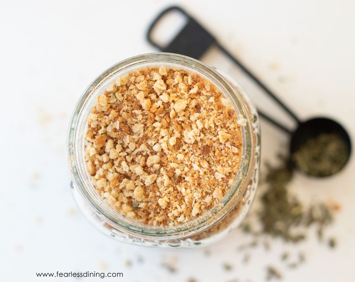 The top view of a mason jar filled with homemade breadcrumbs.