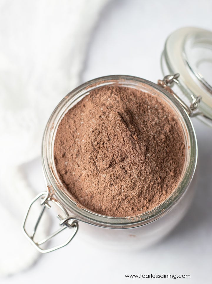 The top view of a mason jar filled with chocolate cake mix.