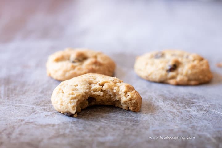 a gluten free rum raisin cookie with a bite taken out