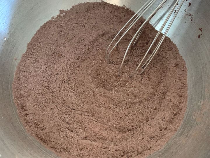 Whisked chocolate cake mix in a large bowl.