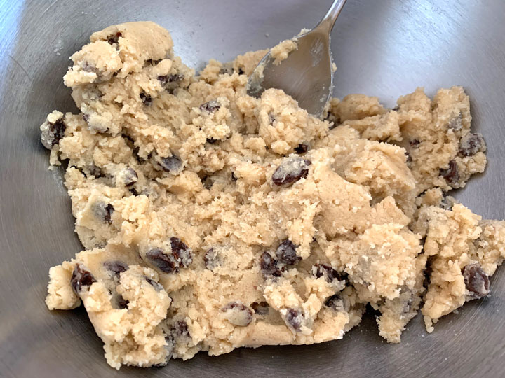 Rum raisin cookie dough in a bowl.