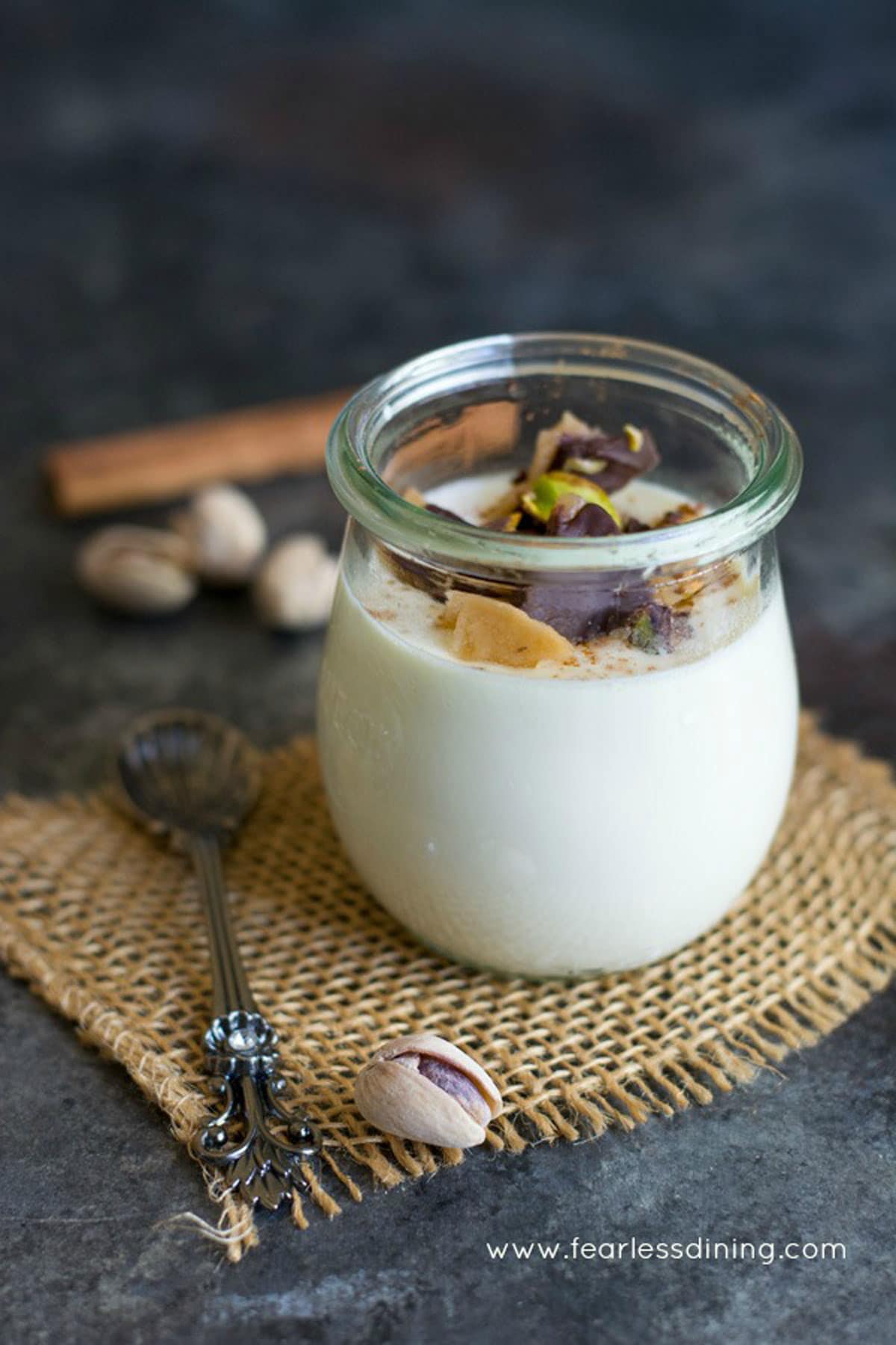 a fancy glass filled with eggnog panna cotta