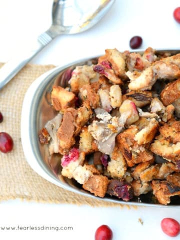 cranberry stuffing in a silver serving bowl