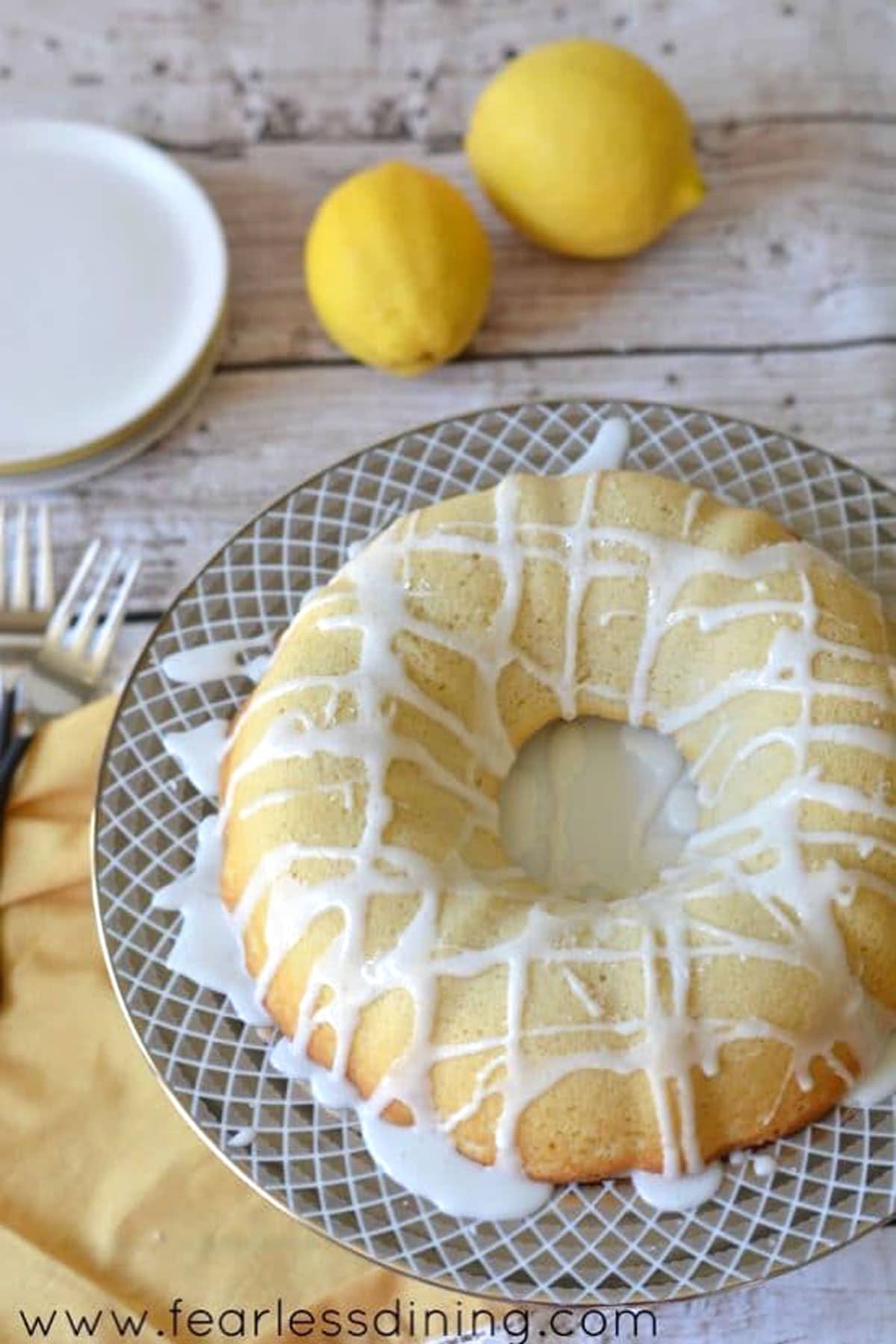 A top view of the lemon bundt cake on a  dessert table.