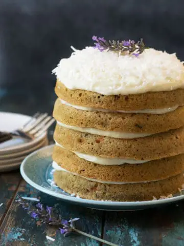 a fancy carrot layer cake with cream cheese frosting