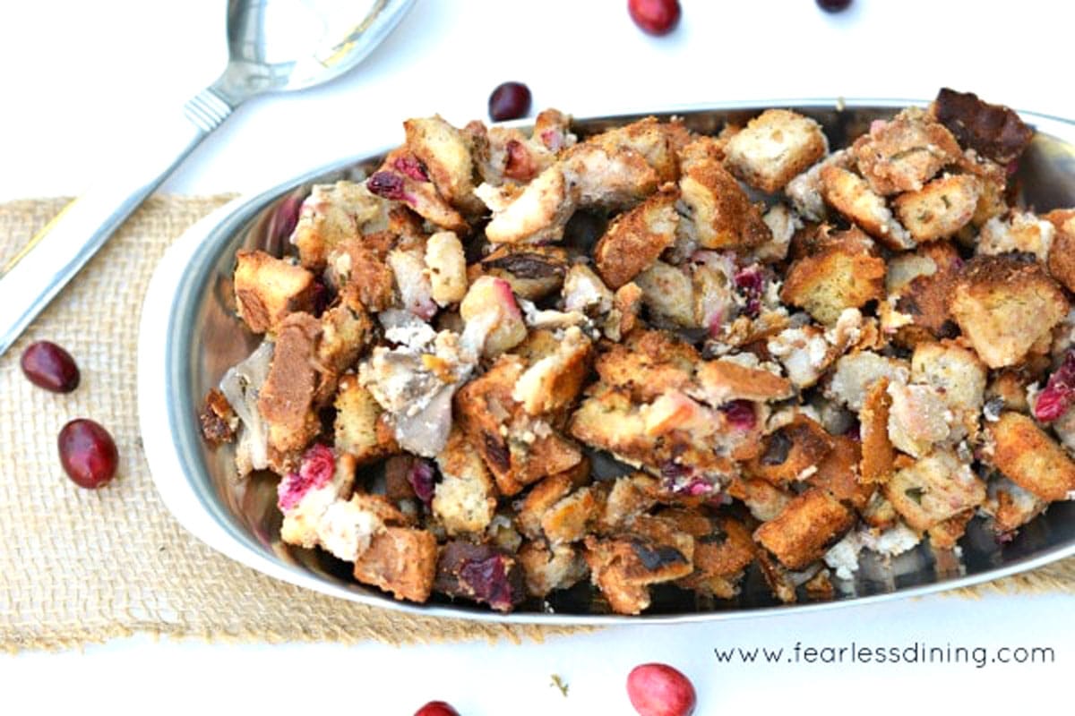 A big silver serving dish filled with stuffing.