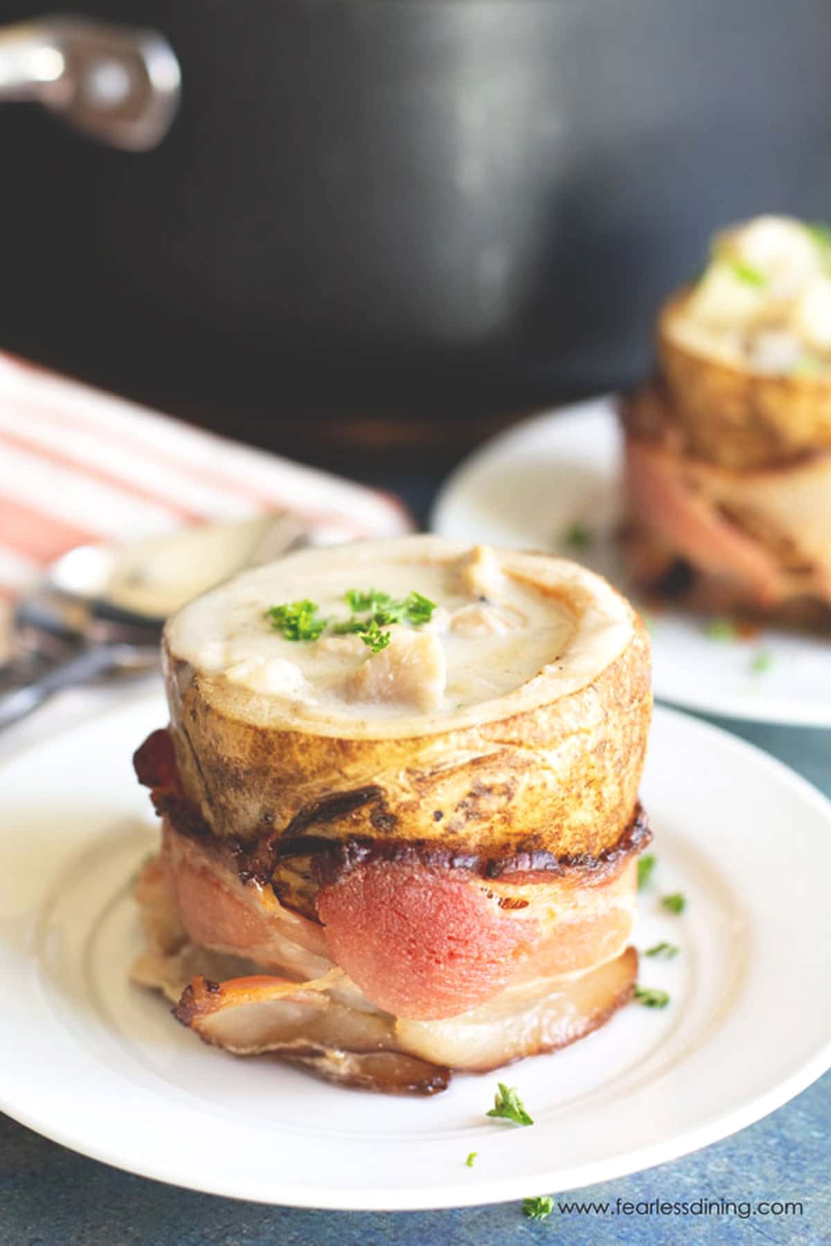 Gluten free clam chowder in a potato bowls.