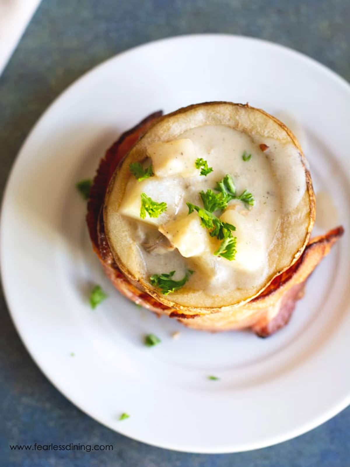 The top view of a bowl of clam chowder.