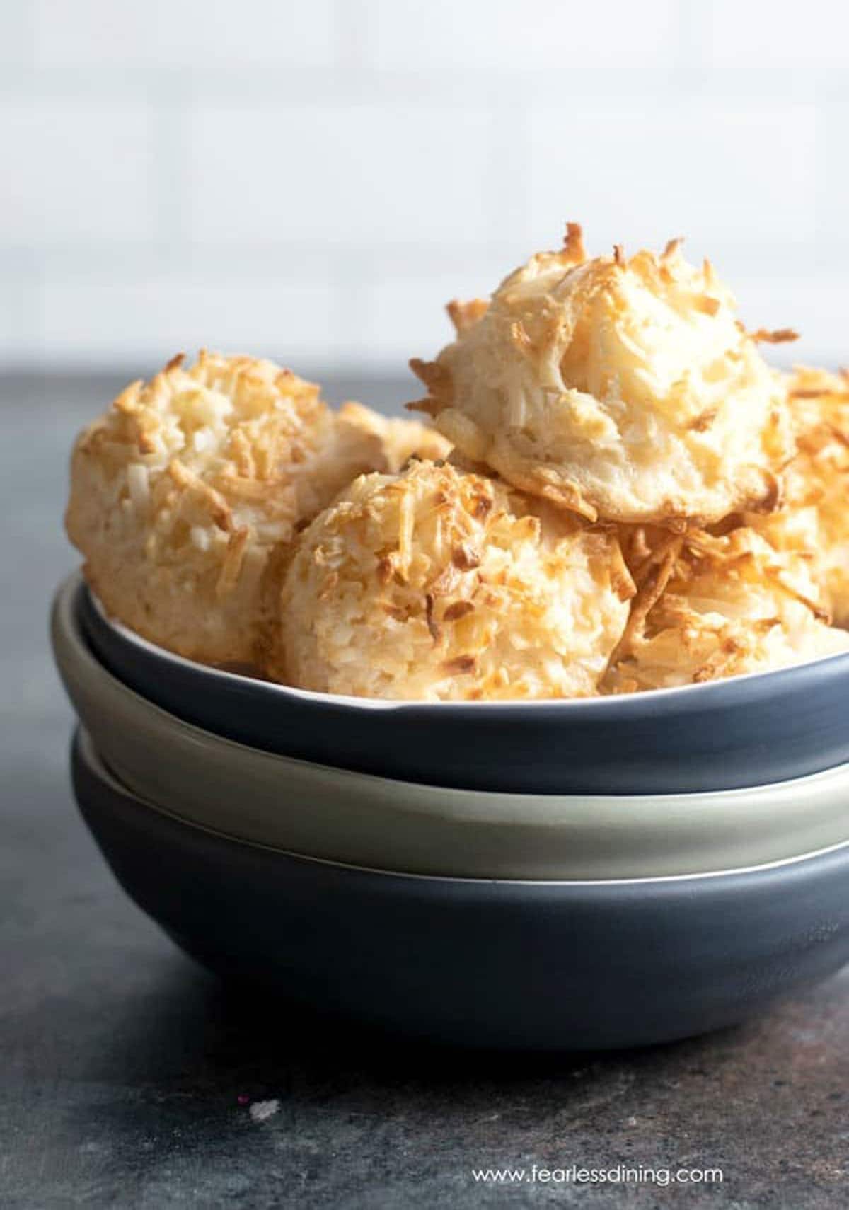 A bowl full of coconut macaroons.