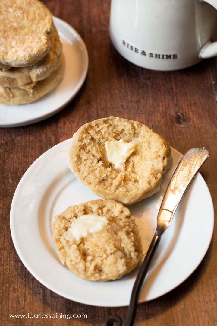 The top view of a gluten free English muffin with butter.