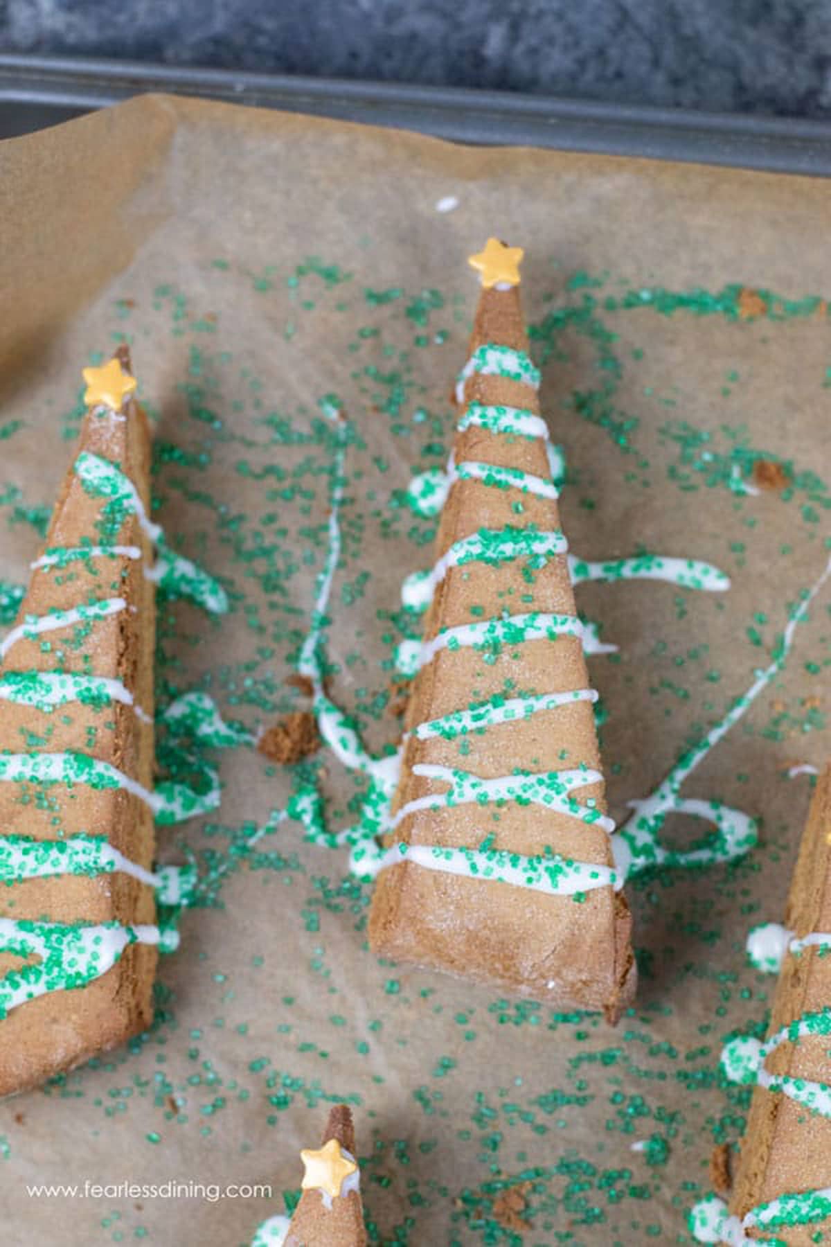 gingerbread biscotti with drying icing and sprinkles