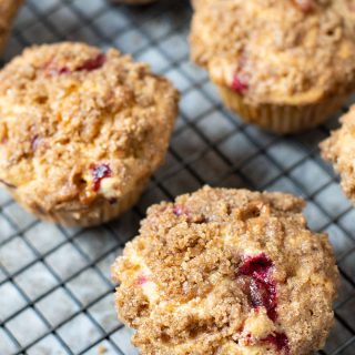 gluten free cranberry muffins on a cooling rack