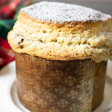 a baked gluten free panettone in a paper mold