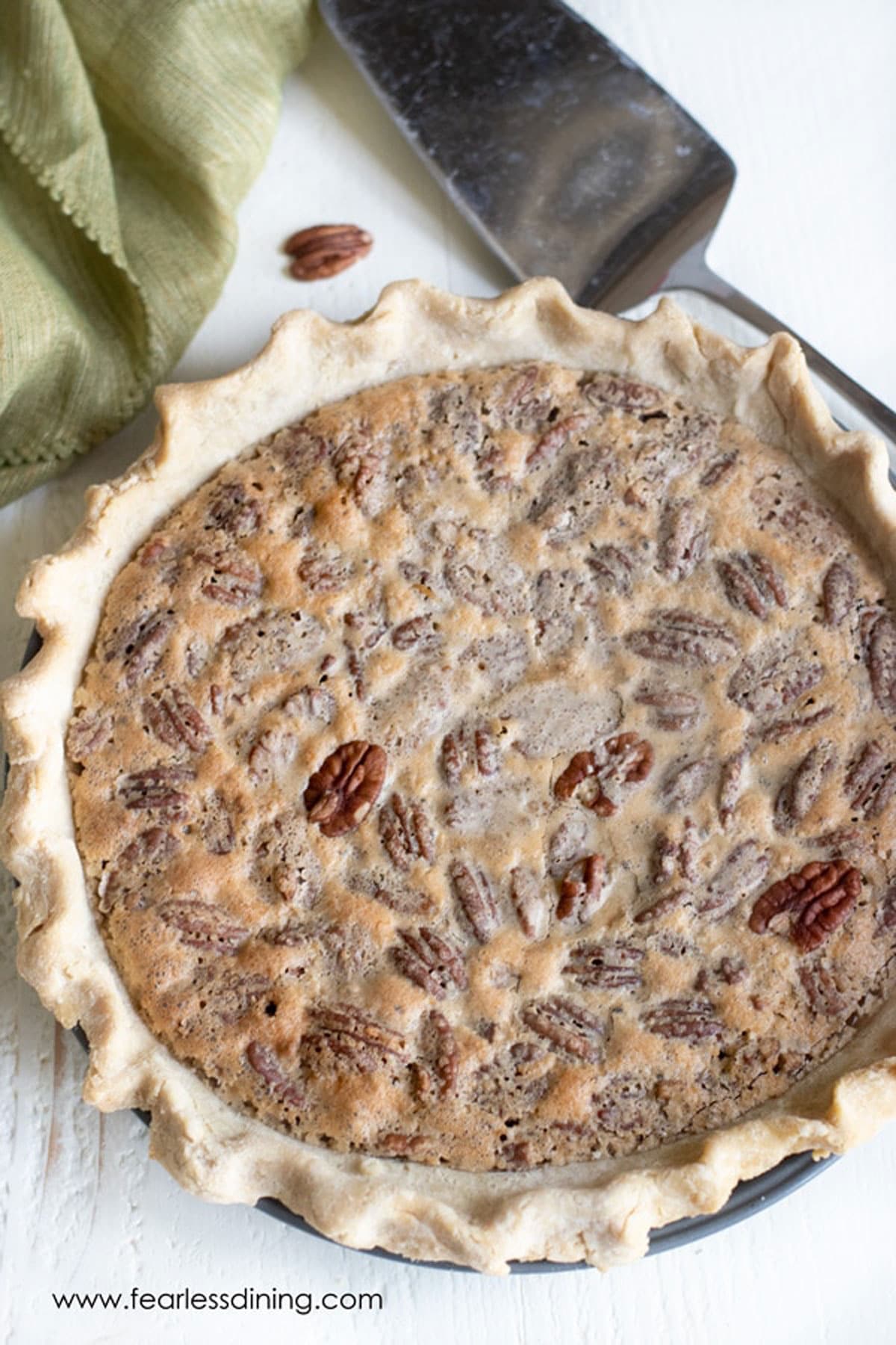 a whole pecan pie on a table