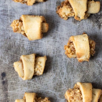 baked rugelach on a cookie sheet