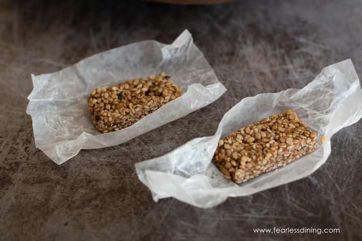 Some unwrapped pieces of sesame candy.