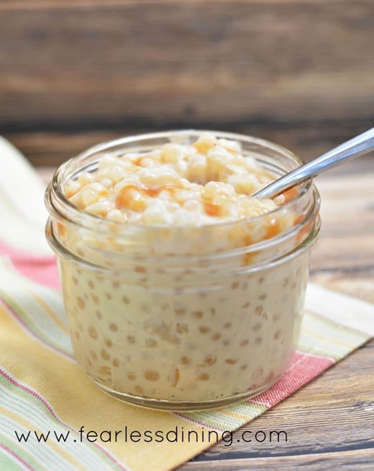 A small mason jar filled with tapioca pudding.