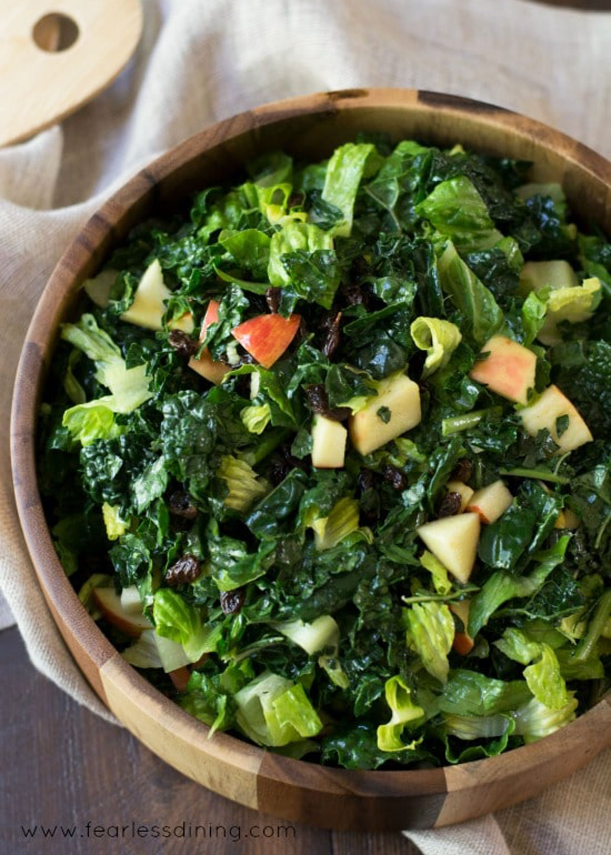 The top view of a big bowl of kale salad.